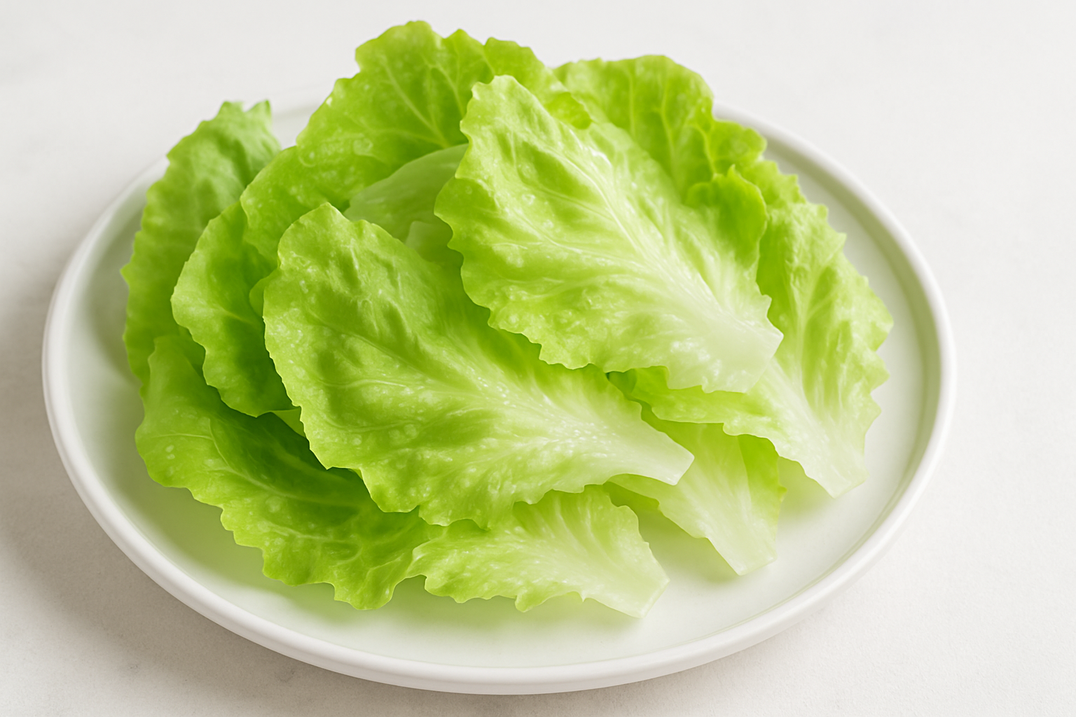 Iceburg lettuce leaves on a plate